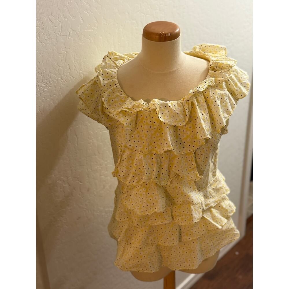 Yellow ruffled top with sunflower pattern